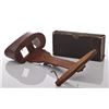 Image 1 : Antique wooden stereoscope viewer with a box of slides
