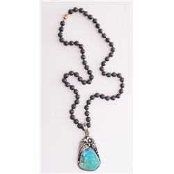 Native American sterling silver and turquoise pendant o