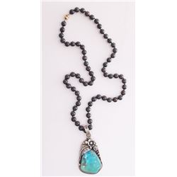 Native American sterling silver and turquoise pendant o