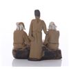 Image 3 : Early 20th Century mud men figurine of three men at a s