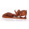 Image 1 : Gator biting a bull, wood carving. African, 20th Centur