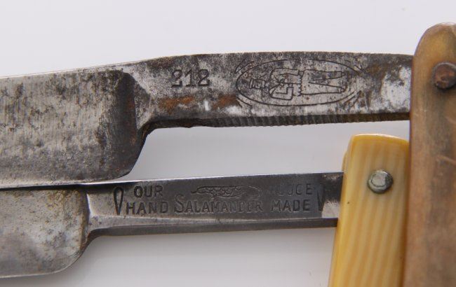 Two(2) antique folding straight razor blades. Markings