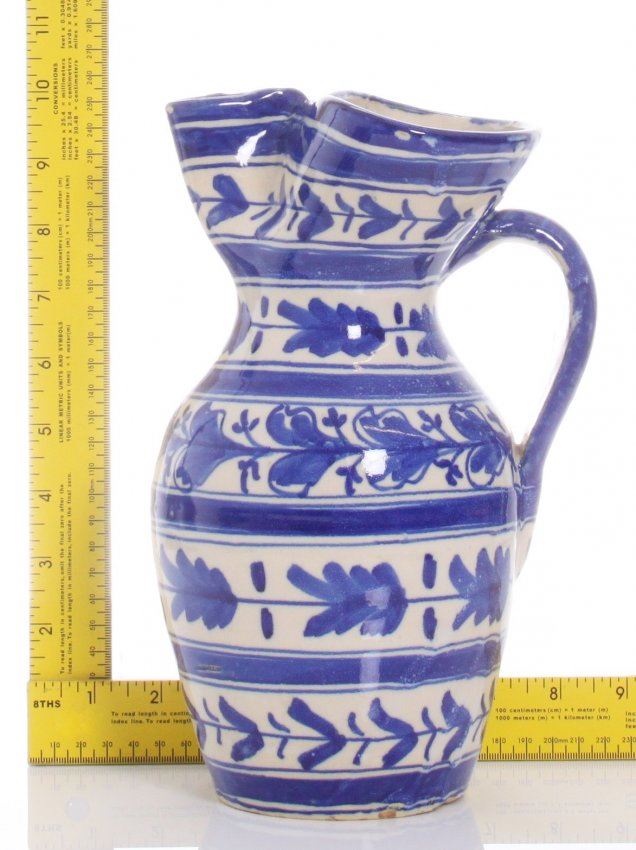 Vintage blue and white ceramic jug with pinch spout. M