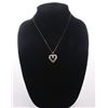 Image 1 : Sterling silver heart shaped pendant with CZ baguette d