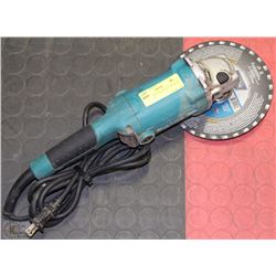 MAKITA ELECTRIC ANGLE GRINDER - WORKING
