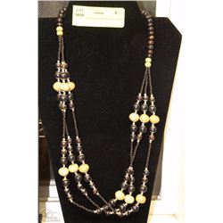 LAYERED BEADED NECKLACE WITH STAND