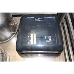 PAPER TOWEL DISPENSER