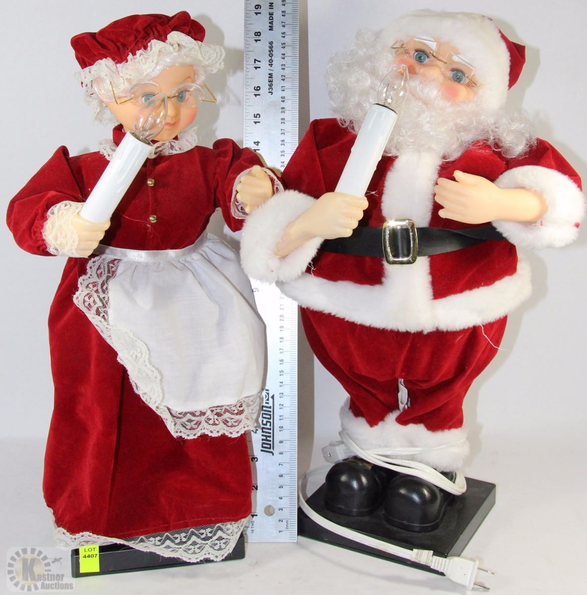 LIGHT UP ANIMATED MR. AND MRS. SANTA CLAUS