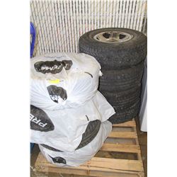 PALLET WITH TWO SETS OF TIRES