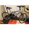 Image 1 : HUFFY RAVINE MOUNTAIN BIKE WITH 24" BACK TIRE