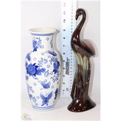 FLAT WITH BLUE AND WHITE VASE AND BIRD ORNAMENT