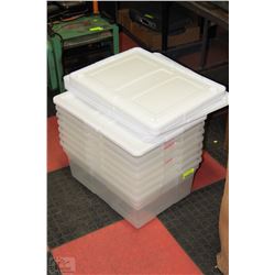 STACK OF RUBBERMAID BINS