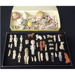 Antique Frozen Charlottes and Other Doll Parts