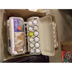 BANANA BOX OF GOLF BALLS