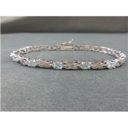 Blue Topaz & Diamond Tennis Bracelet