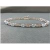 Image 1 : Blue Topaz & Diamond Tennis Bracelet