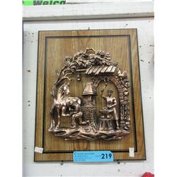 Vintage wall plaque with raised plastic design