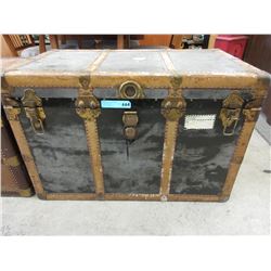 Vintage metal bound steamer trunk