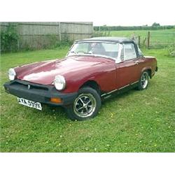 An MG Midget, 1981, registration number AYA 599X, damask red, MOT'd to June 2004, this car has on...