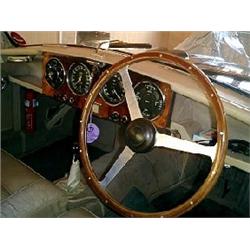 An Aston Martin DB2/4, 1957, registration number XER 553, silver over British Racing Green with a...