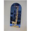 Image 1 : AN ART DECO BLUE TINTED GLASS MIRROR, 1930's, applied stylized castings of two does beneath a tre...