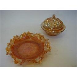 A MARIGOLD CARNIVAL GLASS COVERED BOWL, another bowl and a wavy rim dish (3)  £30-40...