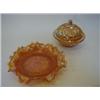 Image 1 : A MARIGOLD CARNIVAL GLASS COVERED BOWL, another bowl and a wavy rim dish (3)  £30-40...