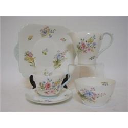 AN EXTENSIVE SHELLEY TEA AND COFFEE SET, Richmond shape, 'Wild Flowers' pattern 13688, two sized...