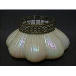 AN IRIDESCENT GLASS ROSE BOWL, metal mount, height 13cm  £30-40...