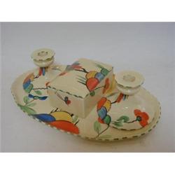 A CROWN DEVON DRESSING TABLE SET, oval tray, pair of candlesticks and square covered box, green d...