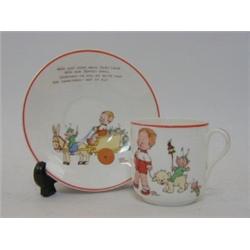 MABEL LUCIE ATTWELL FOR SHELLEY, a nursery cup and saucer, printed fairy subject, (hairline to cu...