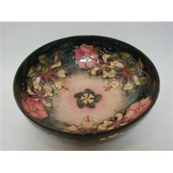 A MOORCROFT FRUIT BOWL, tube-lined honeysuckle design, 'WM' monogram, dated (19) 93, diameter 26c...