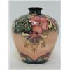 A MOORCROFT BALUSTER VASE, tube-lined honeysuckle design, 'WM' monogram, dated (19) 93, height 18...