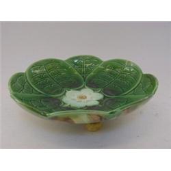 A MAJOLICA DESSERT COMPORT, c.1880, modelled as a lily pad, three ball feet, diameter 26cm  £50-7...