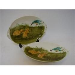 A PAIR OF SARREGUEMES MAJOLICA STANDS, late 19th Century, kingfisher and chicks subjects, impress...