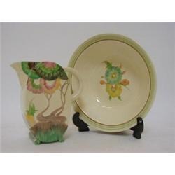 A CLARICE CLIFF BON JOUR JUG, Aurea Iris pattern, (s.d.) with six fruit bowls and matching larger...