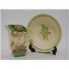 Image 1 : A CLARICE CLIFF BON JOUR JUG, Aurea Iris pattern, (s.d.) with six fruit bowls and matching larger...