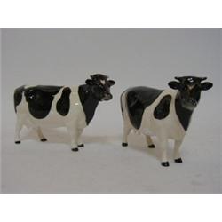 TWO BESWICK FRIESIAN cows, No.1362A, gloss, height 10cm, (one horn s.d.) (2)  £60-80...