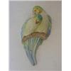 Image 1 : A CLARICE CLIFF WALL POCKET, two moulded parrots on a branch, height 22cm  £100-120...