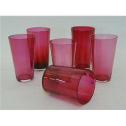 A MATCHED SERIES OF SIX RUBY GLASS BEAKERS, height of tallest 9cm (6)  £30-40...