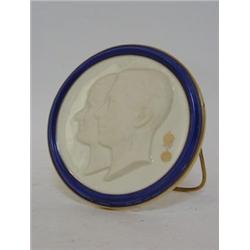 A ROYAL WORCESTER ROYAL COMMEMORATIVE PLAQUE, 1937, circular relief panel of the Monarch and Cons...