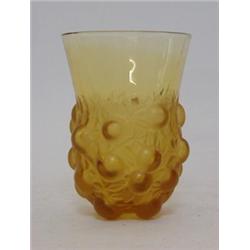 A LALIQUE AMBER GLASS TUMBLER, moulded cherries design, etched 'R.Lalique', height 12cm  £50-80...