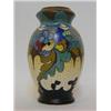 Image 1 : A GOUDA ART POTTERY BALUSTER VASE, abstract foliage design in blue, olive and iron red, signed 'C...