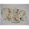 Image 1 : A TAMS WARE ART DECO TEA SET, 'Woodland' pattern, teapot, cream, sugar, cake plate, six tea plate...