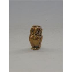 A GILT METAL OWL FIGURE, possibly early 20th Century, slot in back, (for coin?) height 4cm  £20-3...