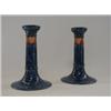 Image 1 : A PAIR OF KEELING & CO CANDLESTICKS, 'Losol Ware', painted fruit on a mottled blue ground, height...