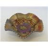 Image 1 : AN AMETHYST CARNIVAL GLASS BOWL, grape and cable design, diameter 18cm  £20-30...