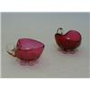Image 1 : A PAIR OF RUBY GLASS CONSERVE DISHES, heart shape, clear loop handles and pincered bases, pontil...