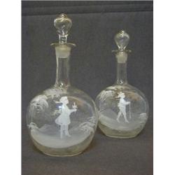 A PAIR OF MARY GREGORY STYLE GLOBE DECANTERS, late 19th Century, clear glass, pontil bases, drop...