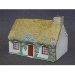 A GOSS MODEL OF MANX COTTATGE, Rd.No.273243, height 9cm  £100-150...